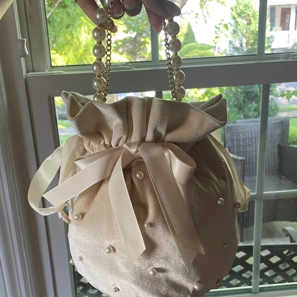 1234.‎ D’margeaux Elegant Cream Drawstring Bag with Pearl Accents